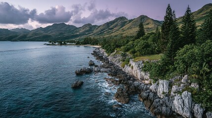 Lush coastline with rocky shore and mountains.
