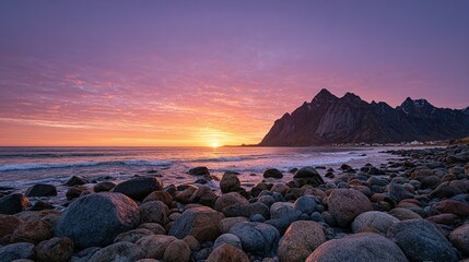 Dramatic sunset over a rocky shoreline.