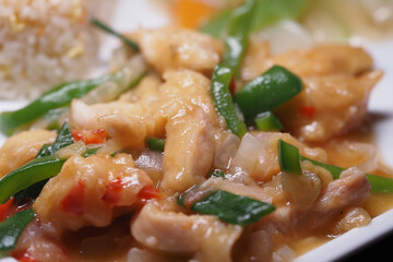 Delicious chicken stir-fry with vegetables on a plate