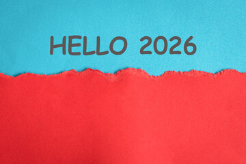 Hello 2026 on blue and red paper background. 