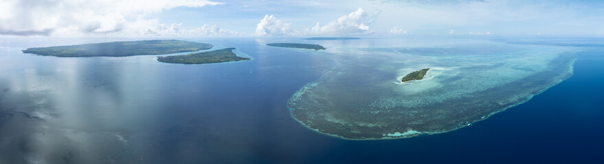 Healthy coral reefs surround the islands within Wakatobi National Park, off the coast of Sulawesi. This area is a popular destination for divers and snorkelers due to its high marine biodiversity.