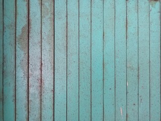 Naklejka premium Weathered Green Wooden Planks Background