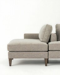 White couch with a patterned fabric and two pillows