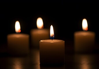 Four Candles Lit in the Dark: A Symbol of Remembrance