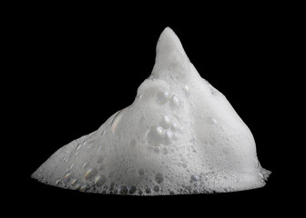 white foam soap isolated on a black background. concept of shampoo bubble, suds texture bathtub. shaving cream gel, bath lather. foam bubble
