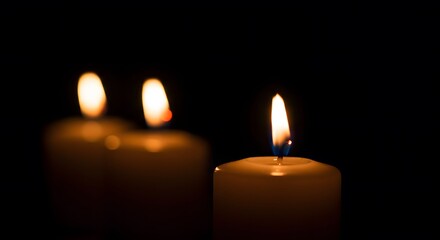 Three Candles in the Dark: A Symbol of Hope and Remembrance