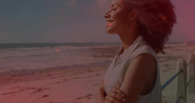 After red filter fading traveler leaning on railing beachside catching animated rays for calm