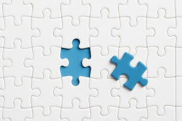 Missing Piece in a Puzzle with Blue Insert and White Background, Concept of Completion, Challenge, and Problem Solving