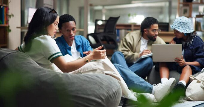 Friends, students and study group with tablet for exam preparation, homework assignment or research project. People, university and discussion with notes, beanbag and knowledge for scholarship test