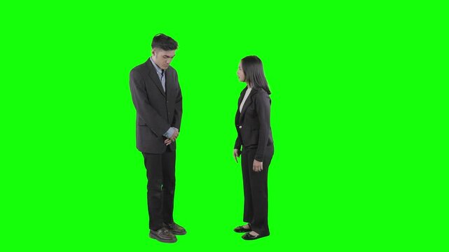 Female Manager Reprimanding Male Employee &mdash; Workplace Dispute on Green Screen