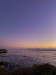 Sunset cliffs ocean beach beautiful post sunset purple glow