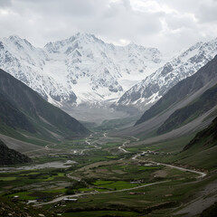 Majestic Mountain Valley: Breathtaking Landscape Photography of Snow-Capped Peaks and Lush Green Valley on transparent background