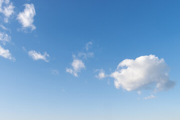Fluffy white cloud on blue sky background, copy space