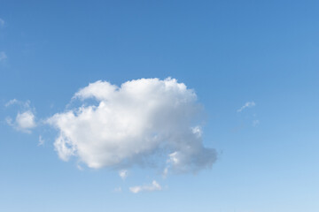 Fluffy white cloud on blue sky background, copy space