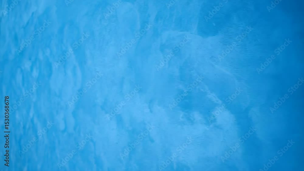 Poster light blue textured abstract background with faint white patterns creating a calm and soothing atmos