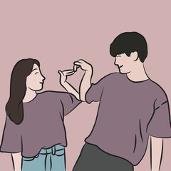 young couple making a heart sign
