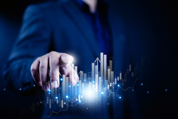 Businessman points to higher graph and chart to analyze stock market, Analysis finance grow and exchange financial growth diagram, Stock Market Investments funds and digital assets. stock, market, inv
