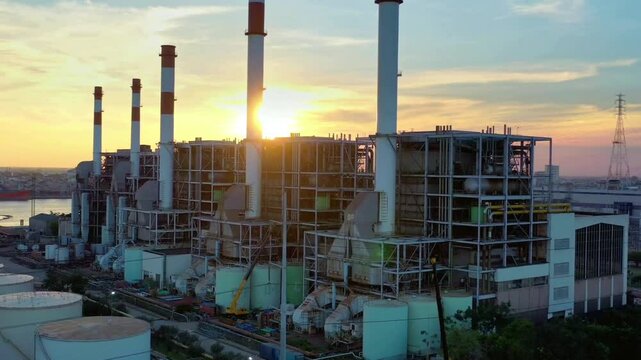 Industrial Plant Construction at Sunset, Aerial View