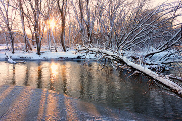 Light of sunset sparkles off the Kishwaukee River in northern Illinois