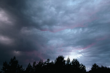 Beautiful colorful stormy sky at sunset. Sunset with mood stormy sky