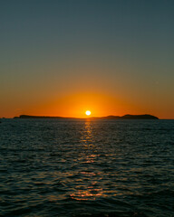 Beautiful sunset from Cafe Mambo in San Antonio Bay on the island of Ibiza in summer.