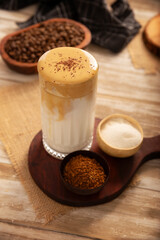 Dalgona Coffee, a cold, sweetened beverage made with milk and frothy coffee cream made with instant coffee, a trendy, refreshing, and easy recipe.