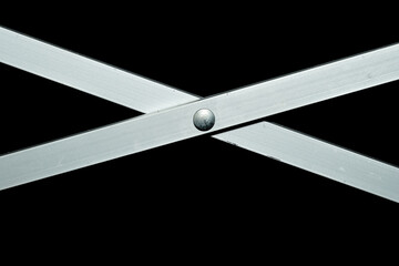 X shaped metal sliding folding crossbar on black