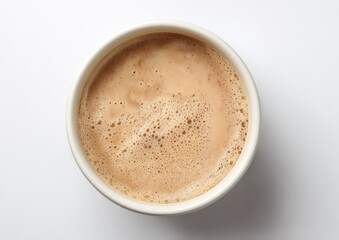 Creamy coffee in a white cup