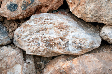 Stone masonry background of large rocks on Elafonissi beach, Crete