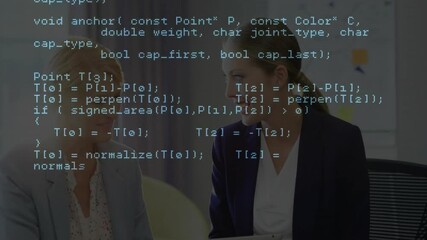 Two businesswomen initiating tech review following code overlay appearing while discussing tablet - Powered by Adobe