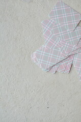 Playing cards, the deck is scattered chaotically on the floor.