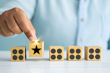 Hand placing star block among other blocks, business concept