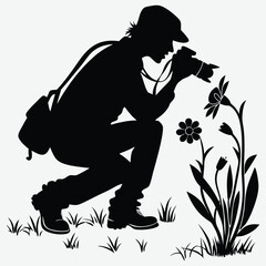 A person crouching to photograph a flower silhouette design vector art and illustration	