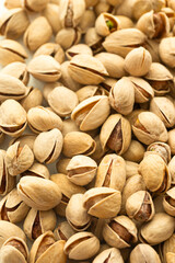 Food Concepts. Extreme Closeup View of Fried Fresh Pile of Yammy Pistachios Both Whole and Grinded.