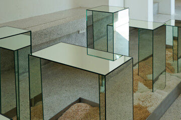 Interior design and decoration of public space decorated with coffee stool table made of glass mirror