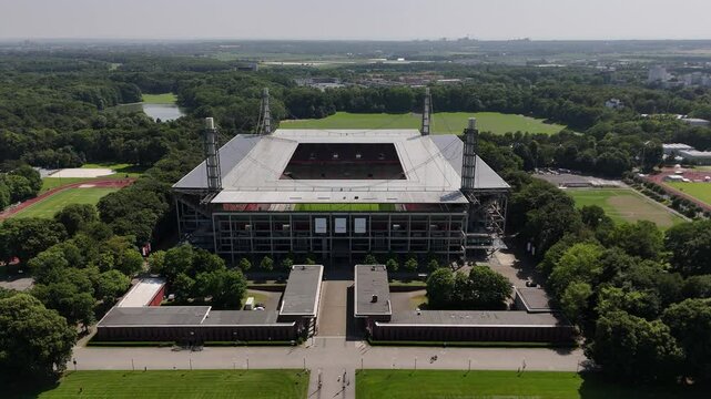COLOGNE, GERMANY &ndash; 11 June, 2025: Aerial view of RheinEnergieStadion, home stadium of 1. FC K&ouml;ln, surrounded by greenery ahead of UEFA EURO 2024 matches.