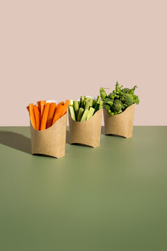 Raw vegetables snack in cardboard scoop tray healthy fast food concept