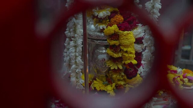 Varanasi, Uttar Pradesh, India-24th February 2025- Close high speed shot of a shiv ling in shiva temple of Varanasi in Uttar Pradesh.