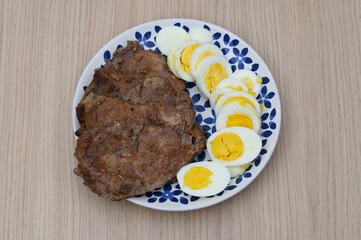 Ketogenic diet, hard-boiled eggs and a piece of steak