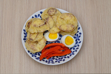 Face made of food on a plate, food looking at you