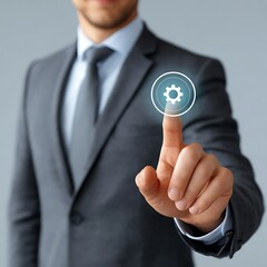 Businessman touching gear icon on virtual screen