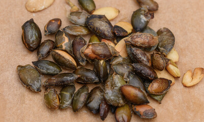 Roasted pumpkin seeds without shell close up, macro