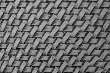 Dark gray geometric background pattern, braided pattern