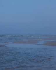 Obraz premium Sea Waves in Blue Light