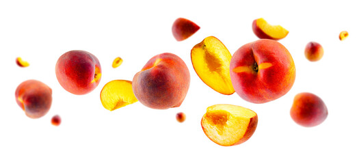 Excellently retouched ripe peaches whole halves and quarters fly in space forming an unusual figure similar to a loop. Isolated on white