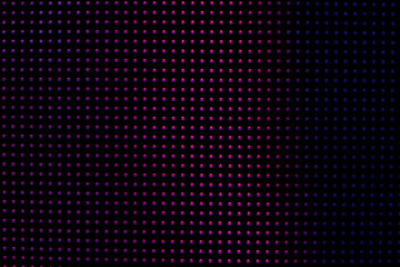 Close-up of LCD Screen Pixels, LEDs on a black background. Macro photography of a bright LED screen