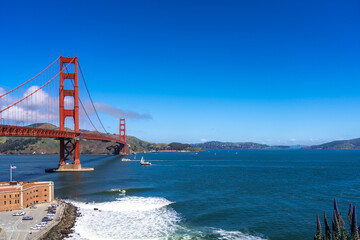 Golden Gate Bridge over blue waters with scenic hills in San Francisco