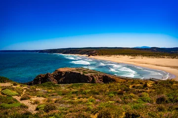 Selbstklebende Fototapeten Empty Bordeira beach in Portugal. Beautiful Algarve coastline. View at sandy beach and cliffs   © Jacek Chabraszewski