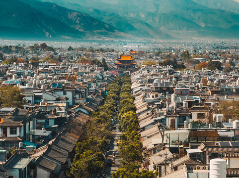 Aerial shot of Dali old town with cherry blossom in spring	
