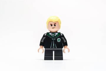 Fototapeta premium Antalya, Turkey - June 11, 2025: Smirking LEGO Draco Malfoy minifigure in Slytherin uniform